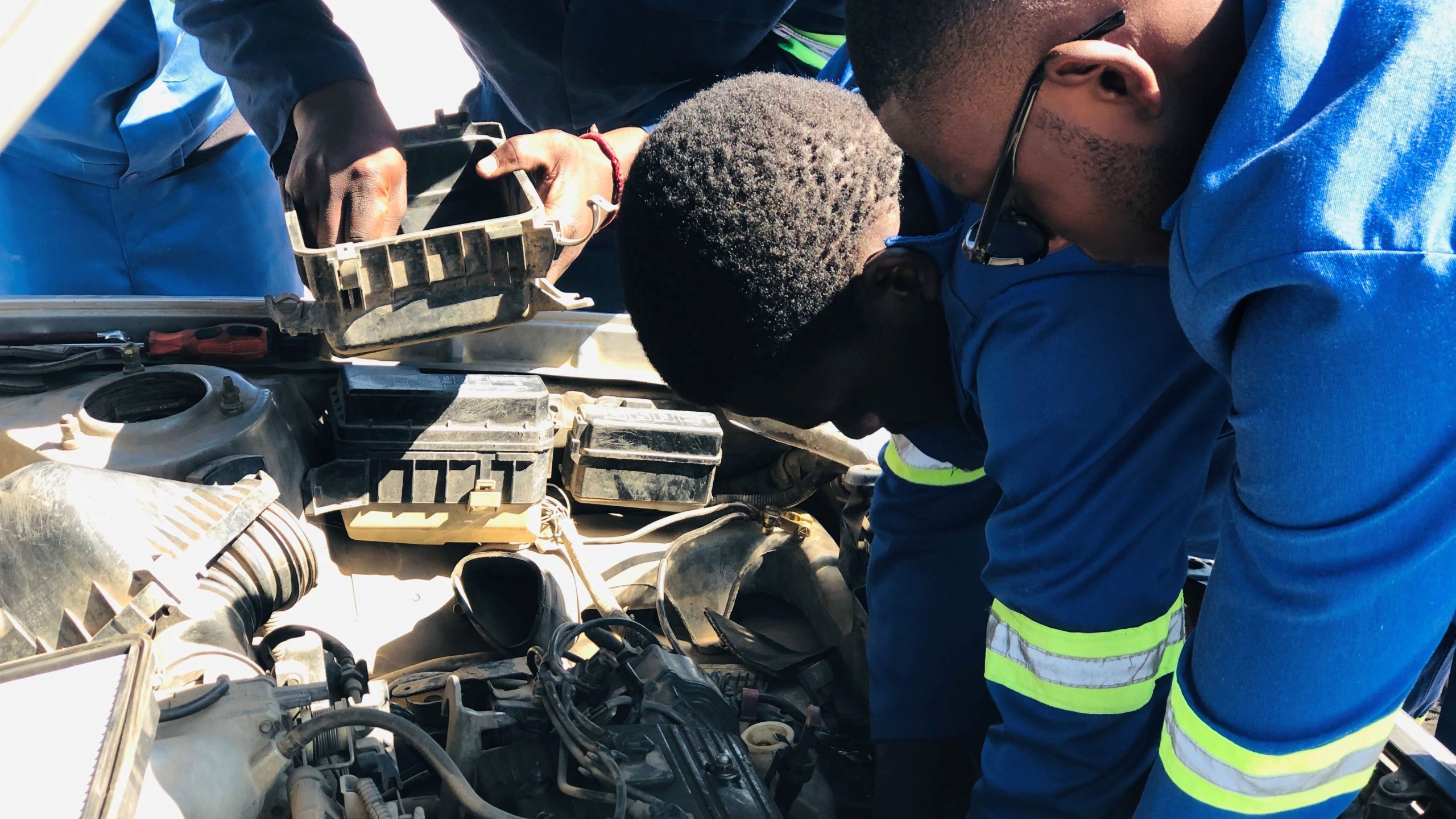 Trainees conducting pre-operational checks and understanding