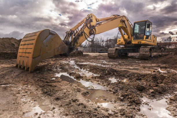 A rainy ground that is slippery dangerous for operation